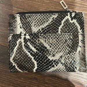 Authentic Guess - Women's White and Black Small Wallet ( rattlesnake simulation)